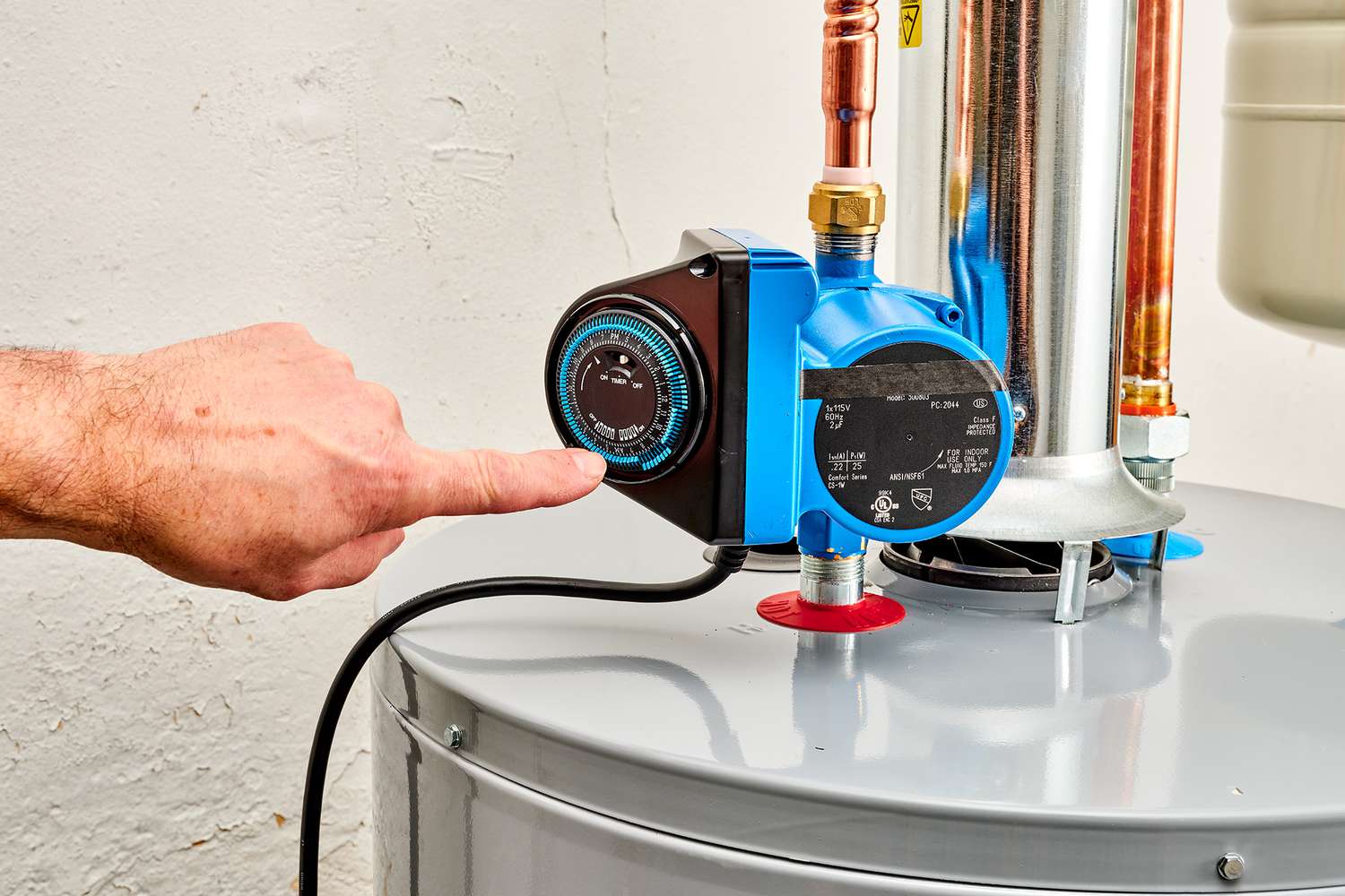 Water pump installation technician at work